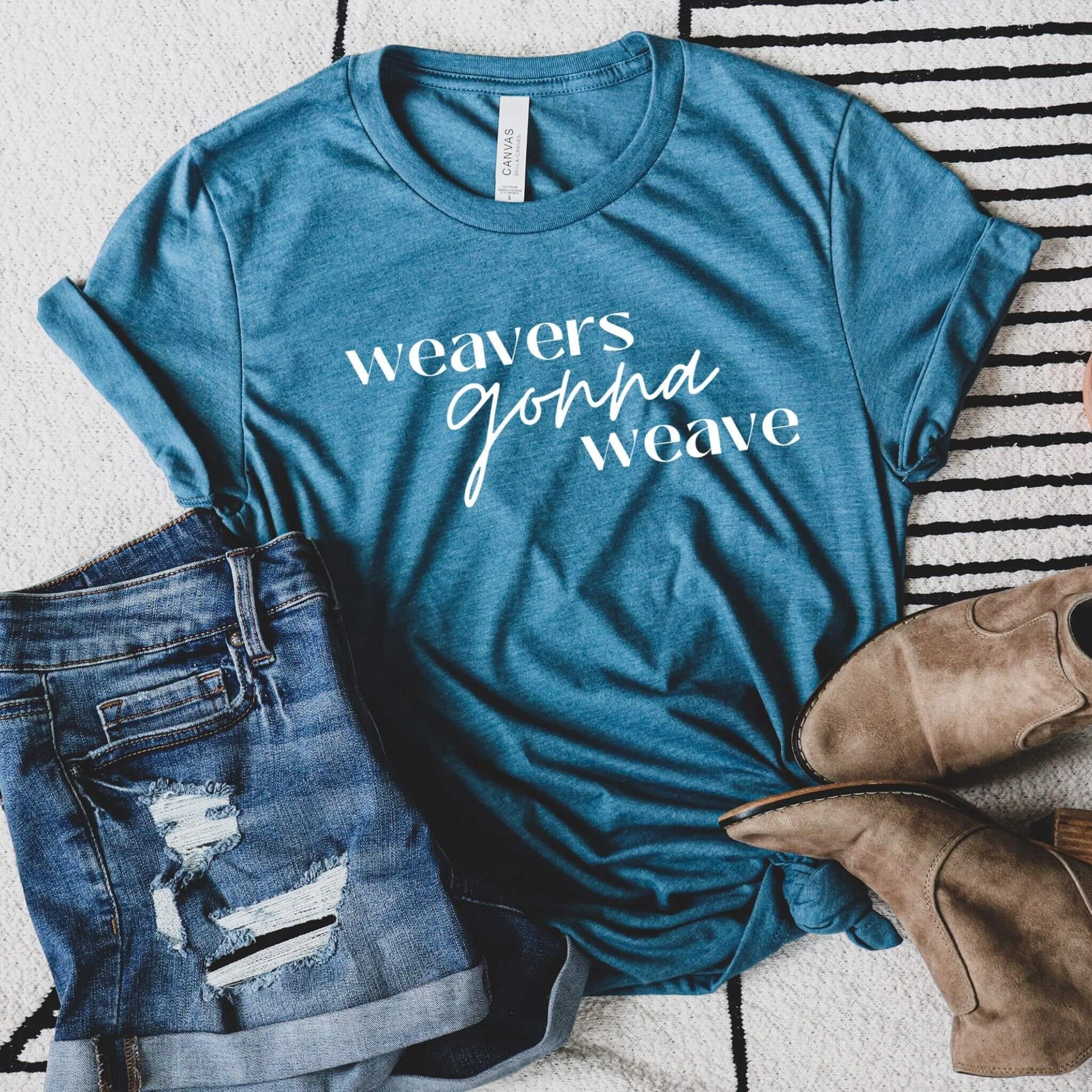 heather blue t-shirt with words weavers gonna weave 