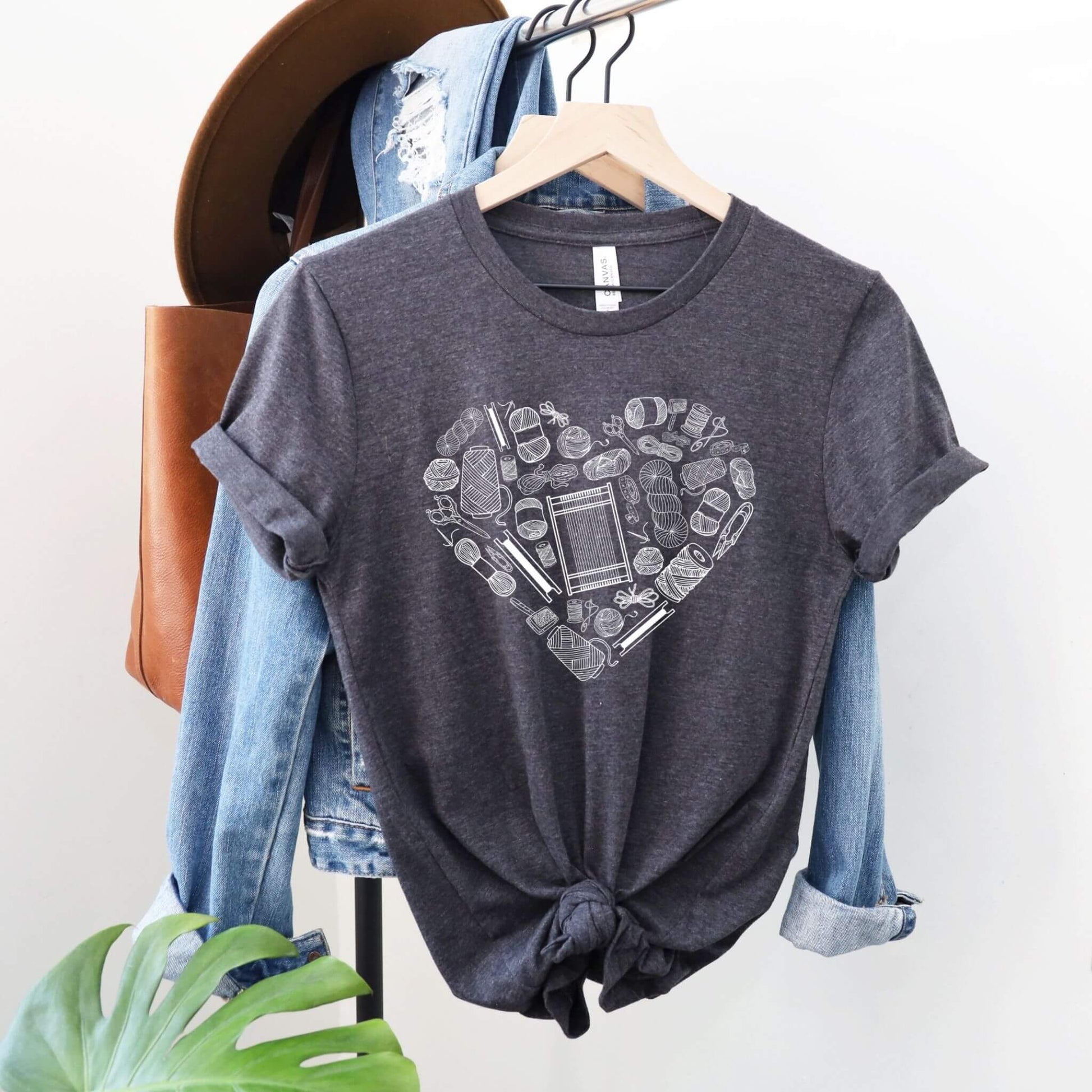 weaving love dark gray t-shirt with looms and other weaving tools in the shape of a heart